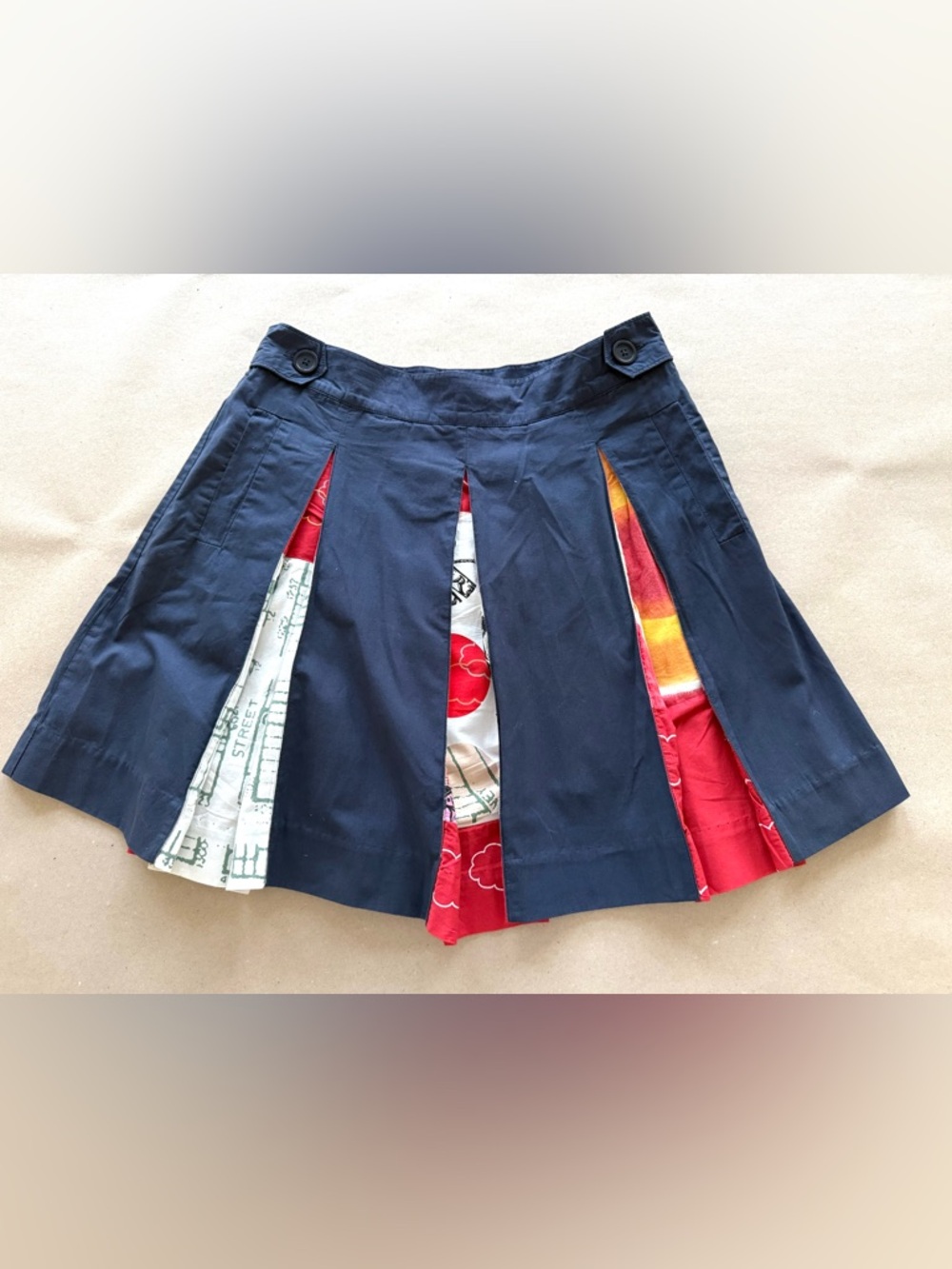 Anthropologie — NWOT Lithe Navy Pleated Skirt with Colorful Insert Panels